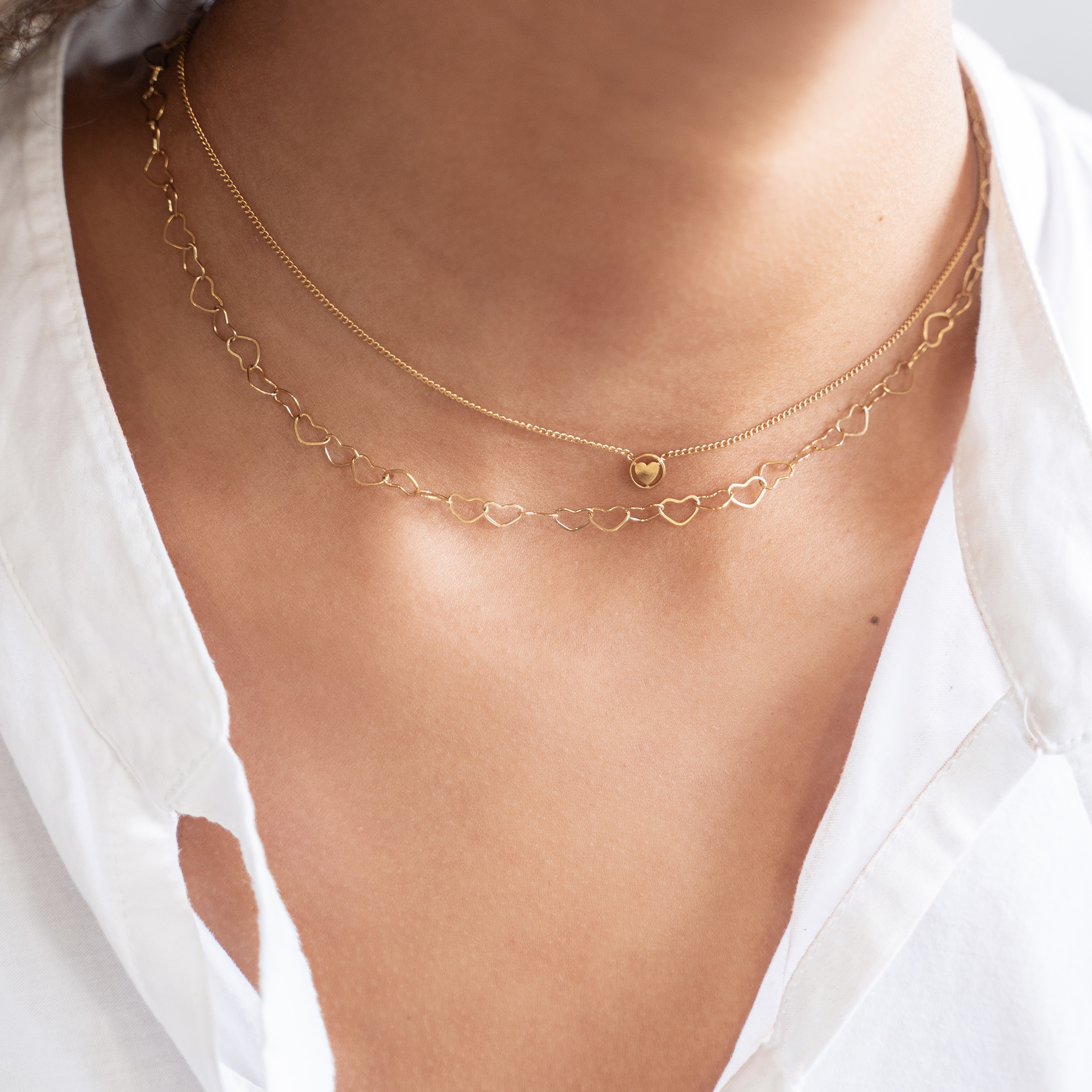 Ketting verbonden open hartjes