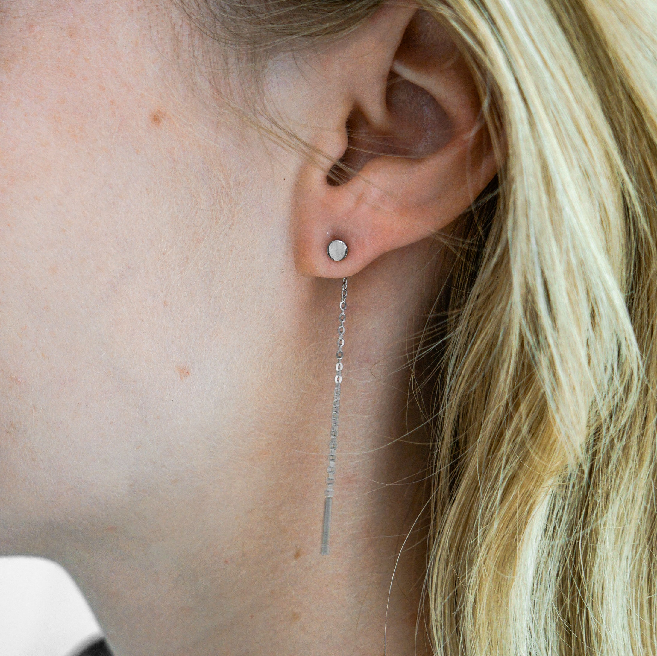 Stud doortrek oorbellen muntje Stud doortrek oorbellen muntje