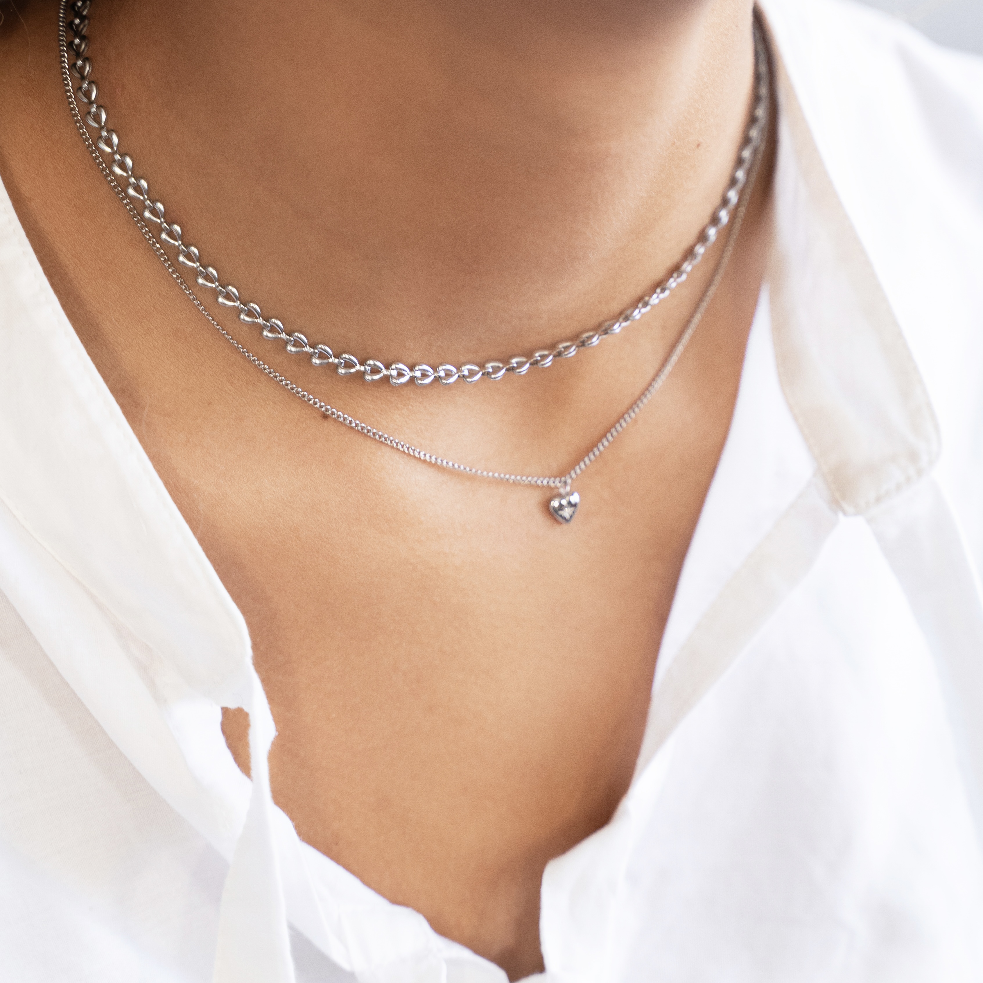 Necklace connected hearts
